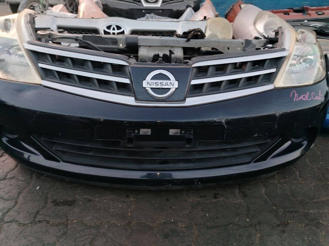 Nose cut Nissan Tiida