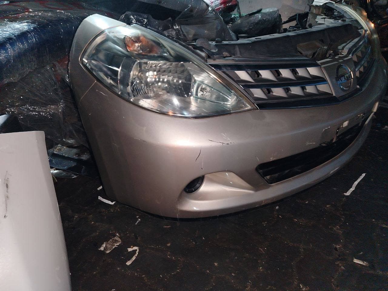 Nose cut Nissan Tiida used in Sharjah — photo 6