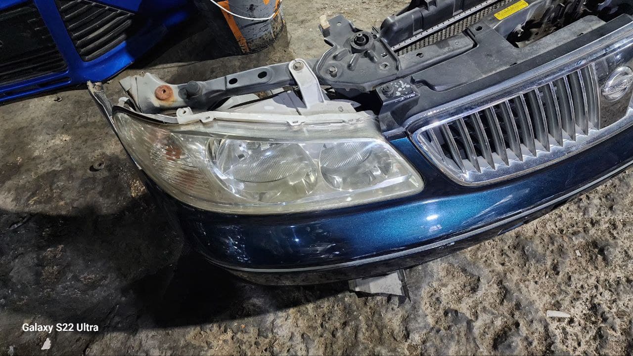 Nose cut + Hood + Fender Nissan Sunny N16 used in Sharjah — photo 2