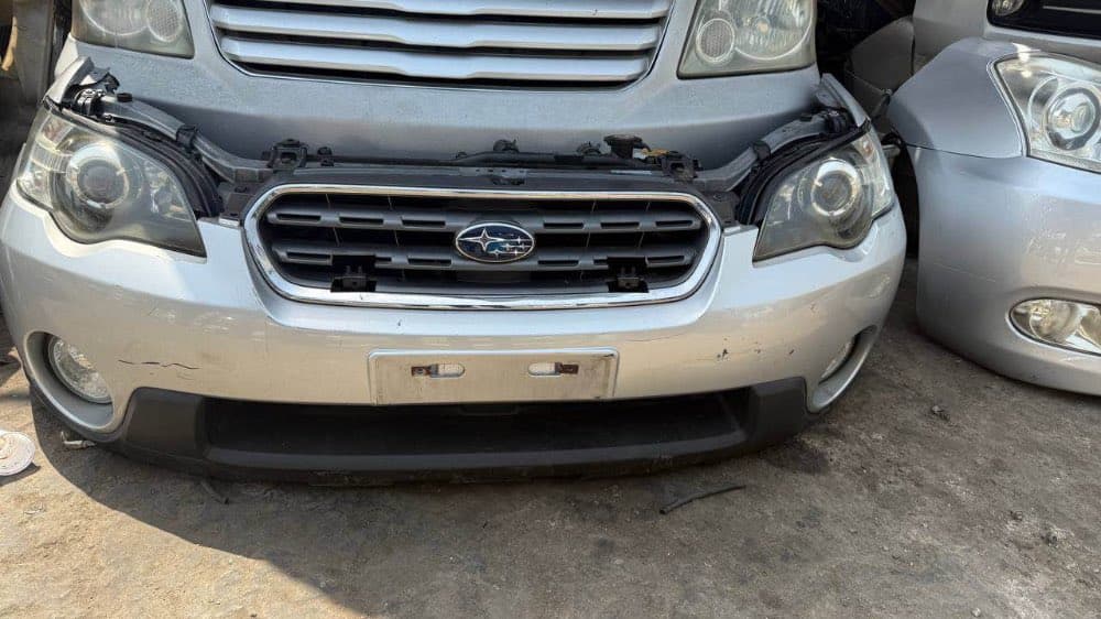 Bumper + Headlights Subaru Outback