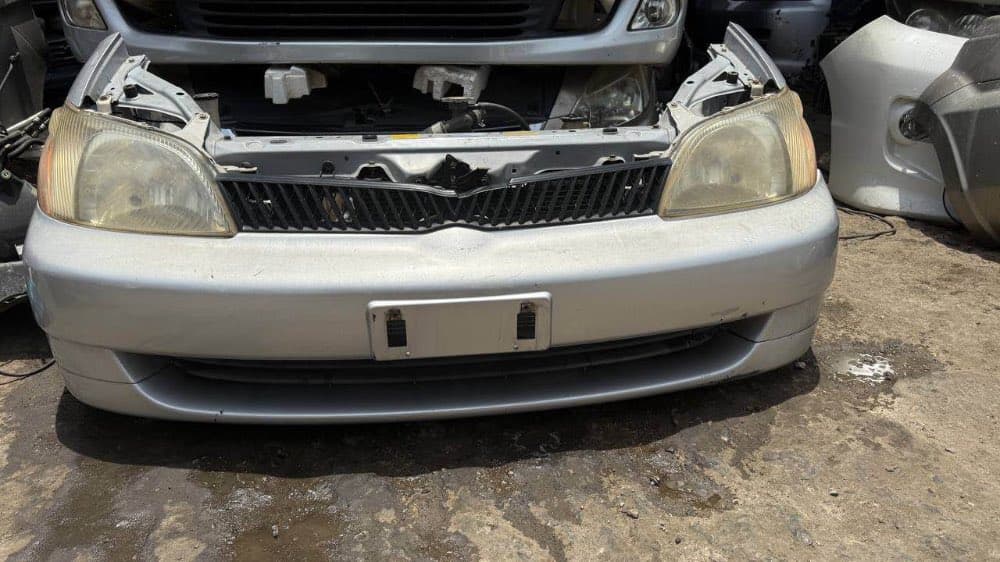 Bumper + Headlights Toyota Platz