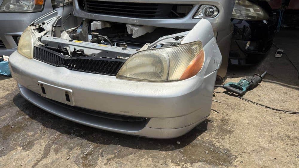 Bumper + Headlights Toyota Platz used in Sharjah — photo 2