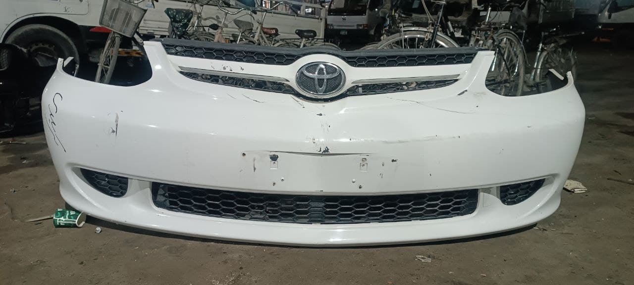 Bumper + Headlights Toyota Platz