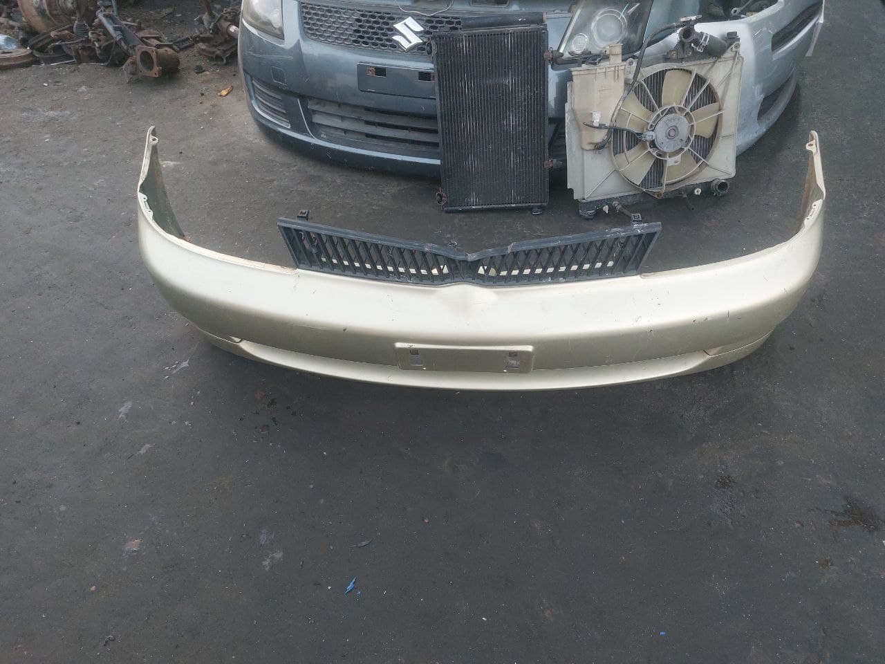 Bumper + Headlights Toyota Platz
