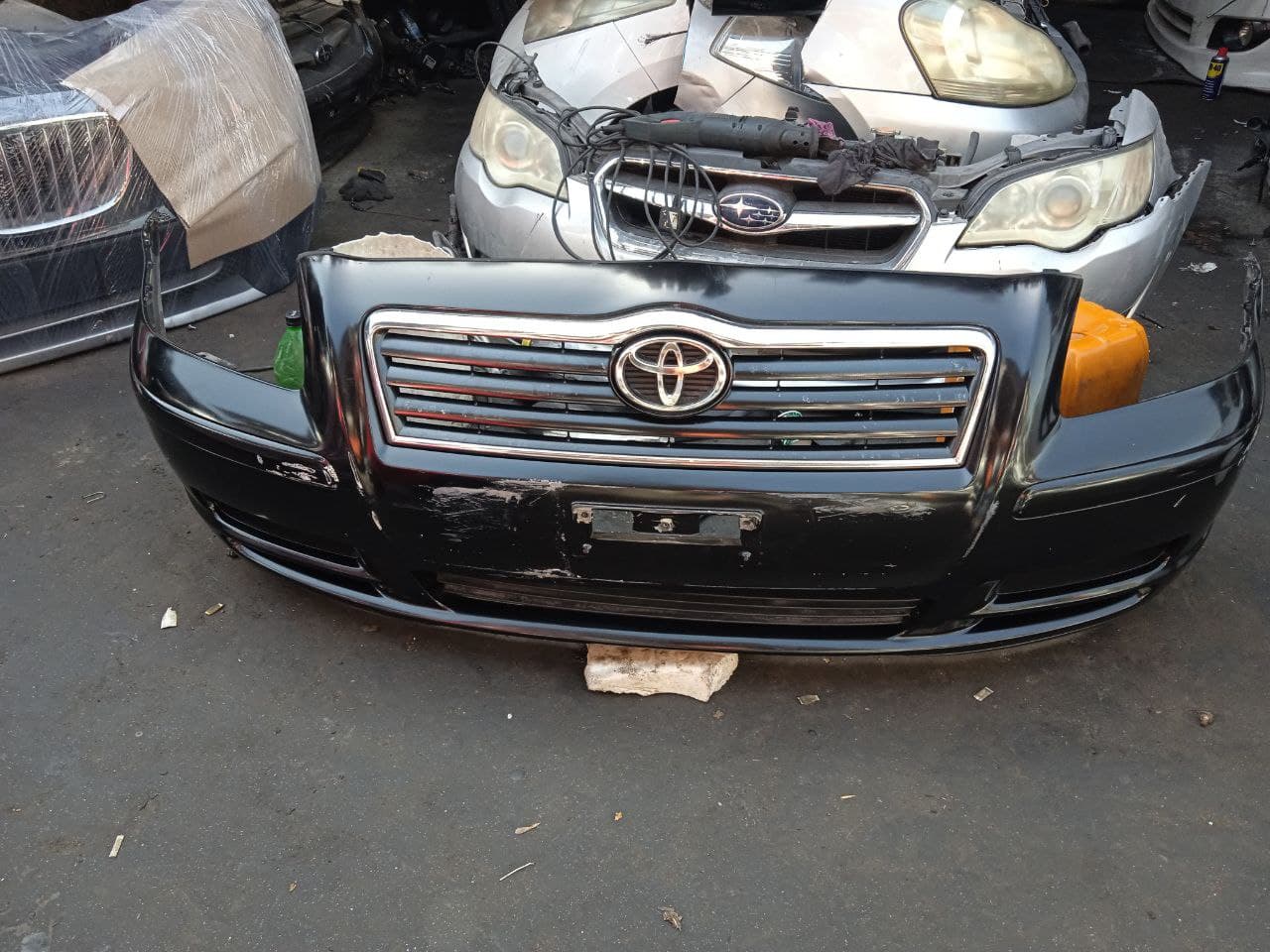 Bumper + Headlights Toyota Avensis