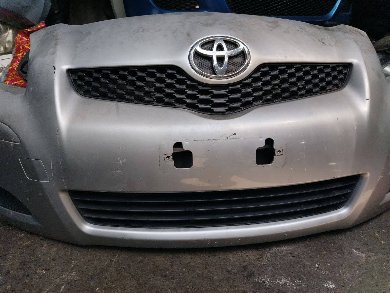 Nose cut + Headlights Toyota Vitz 2009